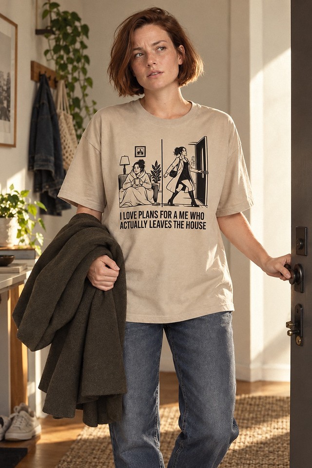 The shirt worn in a hallway, coat over one arm and a hand on the latch