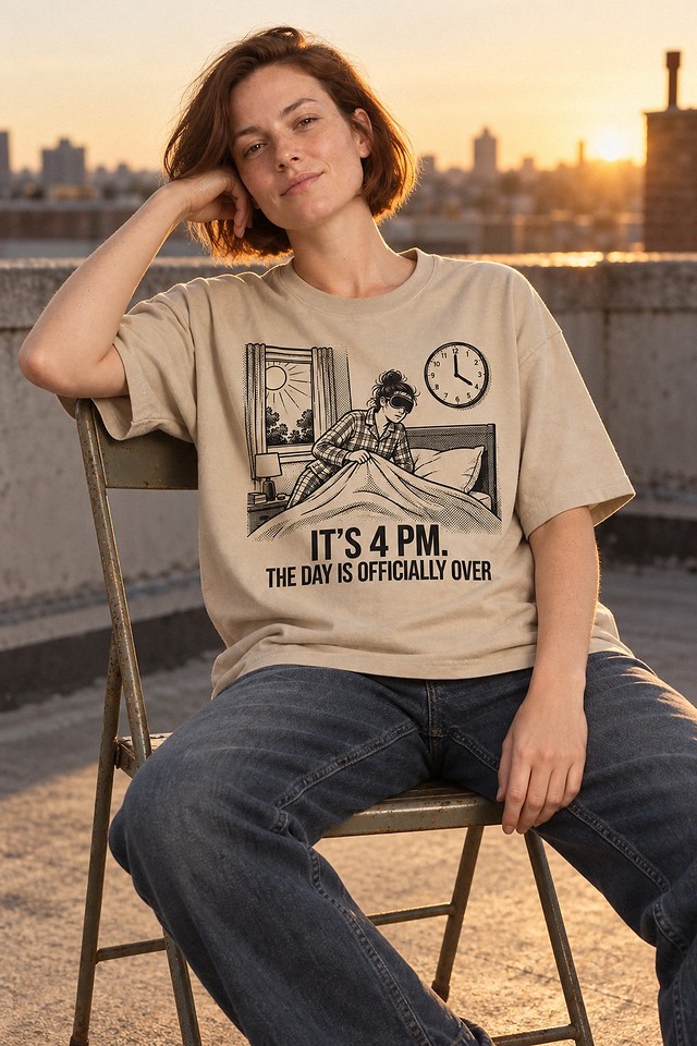 The shirt worn on a rooftop at sunset, slumped into a folding chair