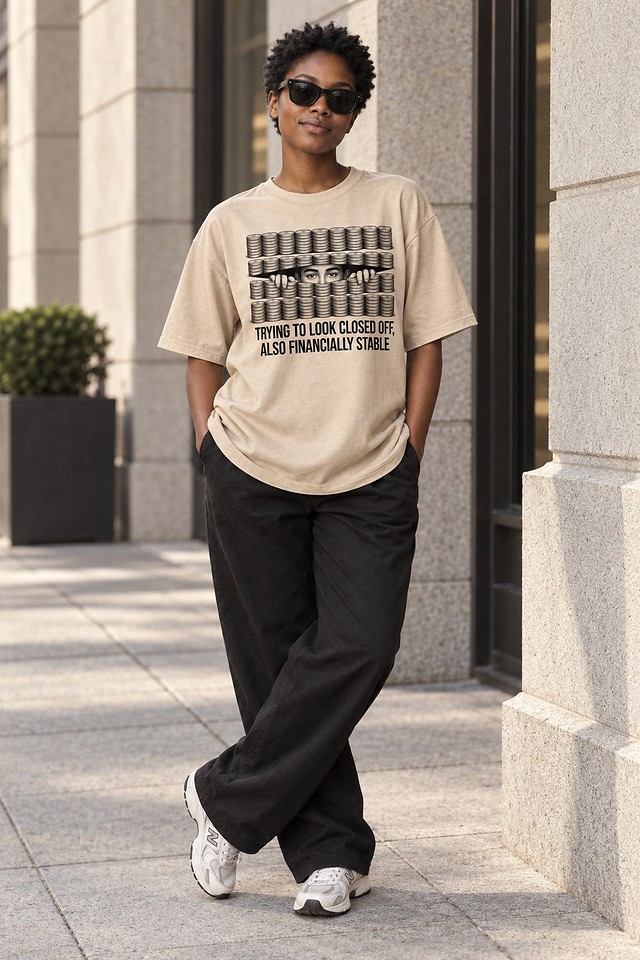 The shirt worn on a financial-district pavement in dark sunglasses