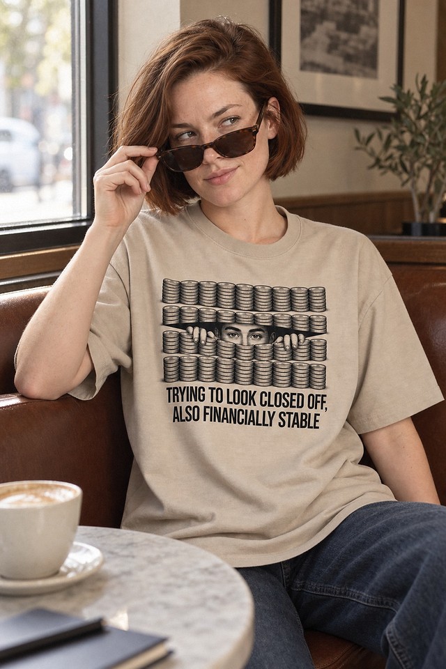 The shirt worn in a cafe booth, sunglasses tipped down